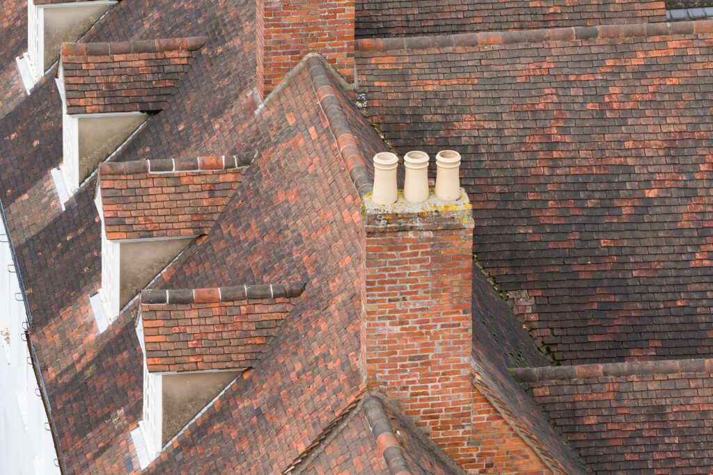 Rooves of a row of houses viewed from above UK