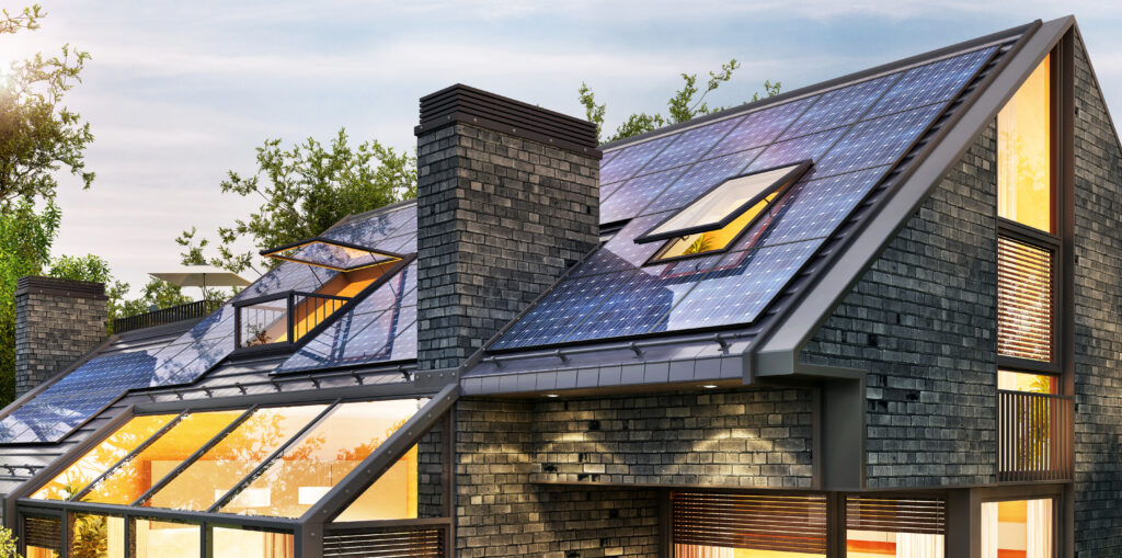 Solar panels on the roof of a modern house. Evening view