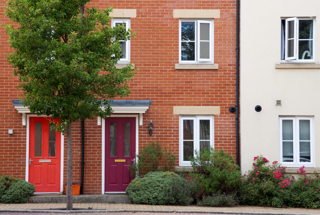 Houses or flats in row, England, party wall