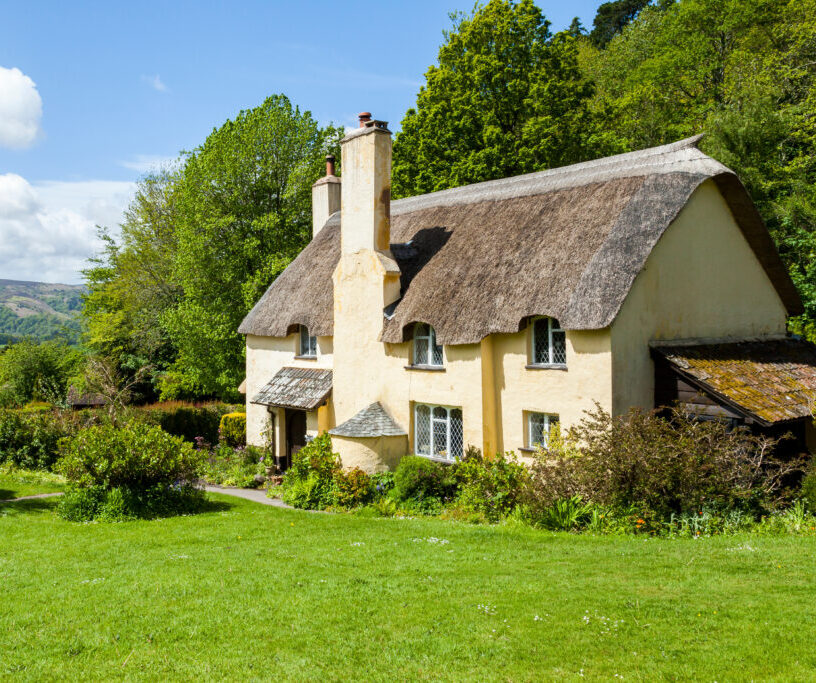 Thatched roof cottage in a typical English village